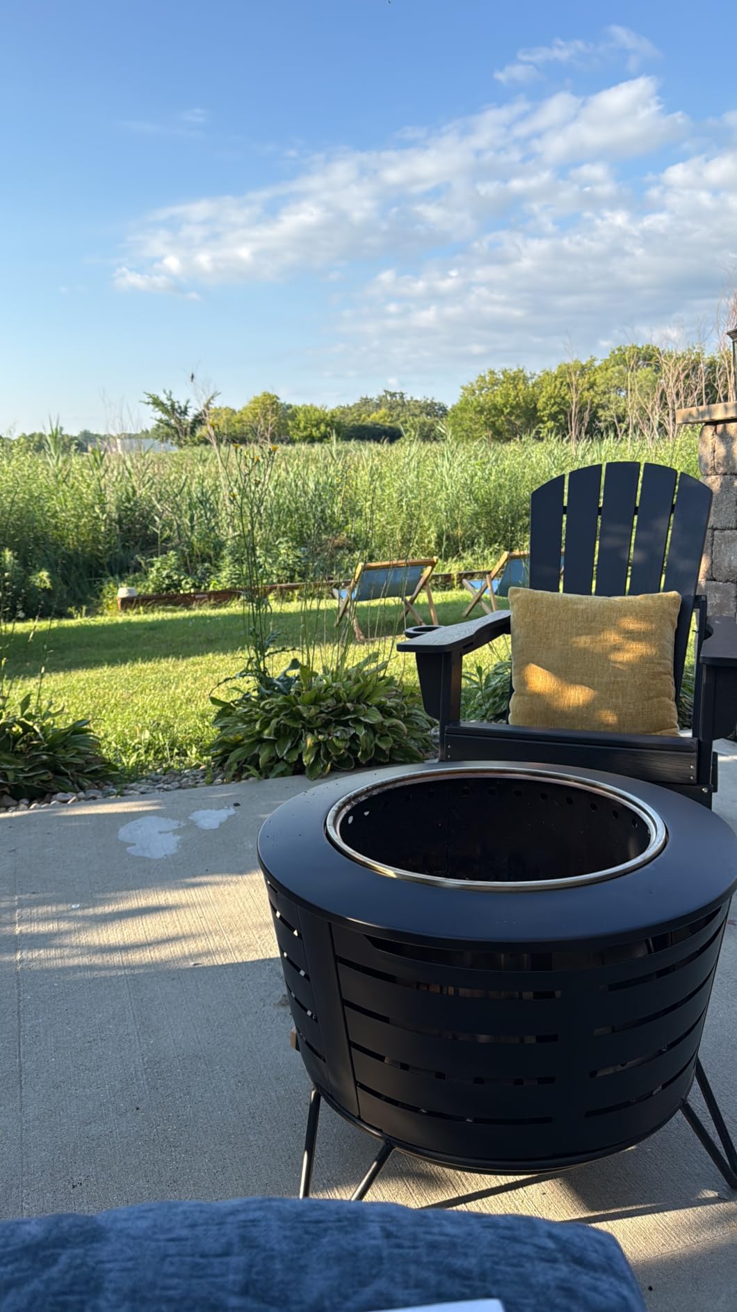 TIKI Patio Smokeless Fire Pit, 25 in Wood Burning Fire Pit with Cover | Black, 25-Inch, Stainless Steel, Wood-Burning, For Backyards and Patios, Includes Cover, Removable Ash Pan, Stand Included customer photo 2