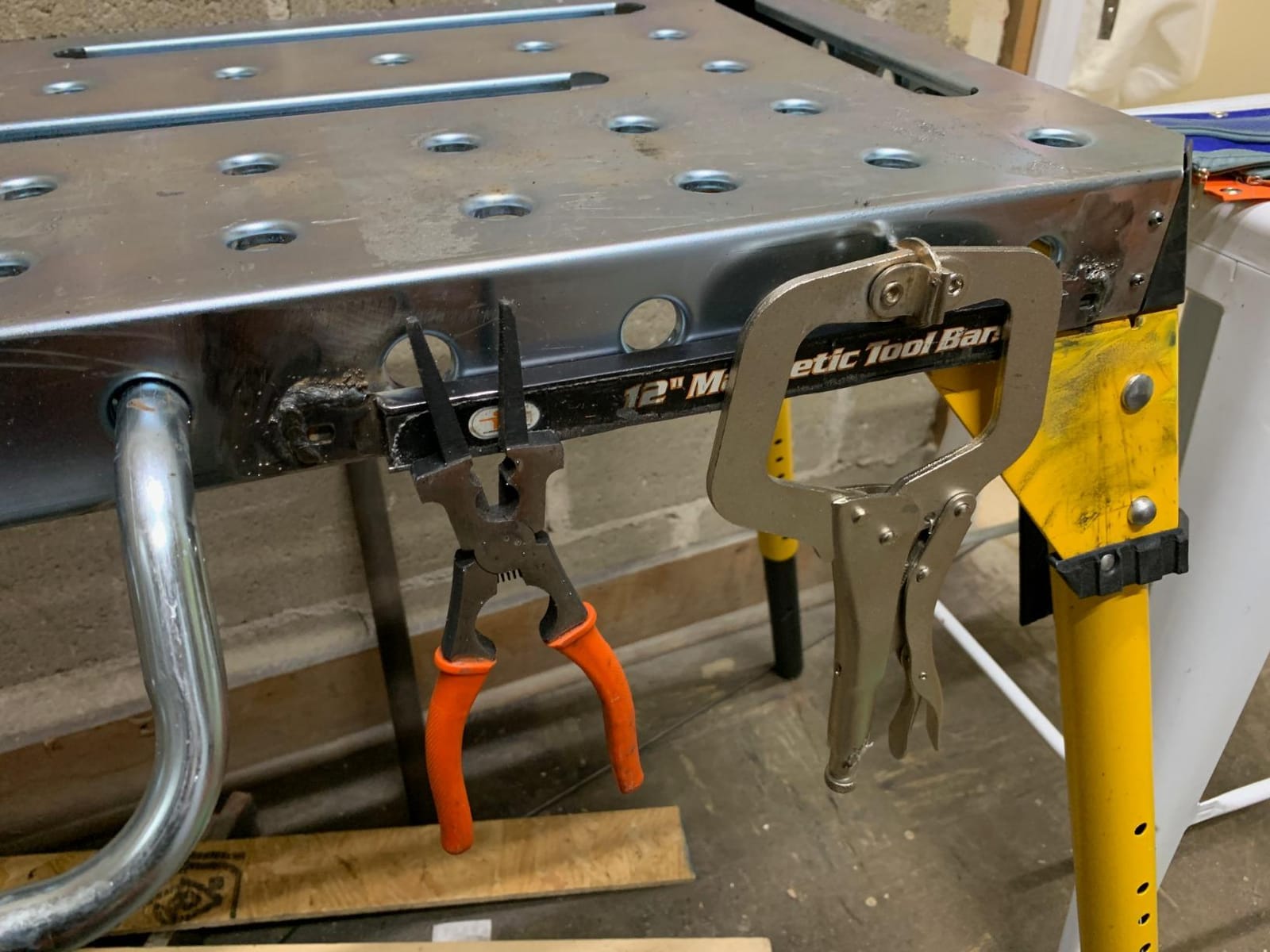 Dewalt Adjustable Height Portable Steel Welding Table and Work Bench, 18 x 46-inch Tabletop, Folding Legs, Carrying Handle, and Cord Minder customer photo 2