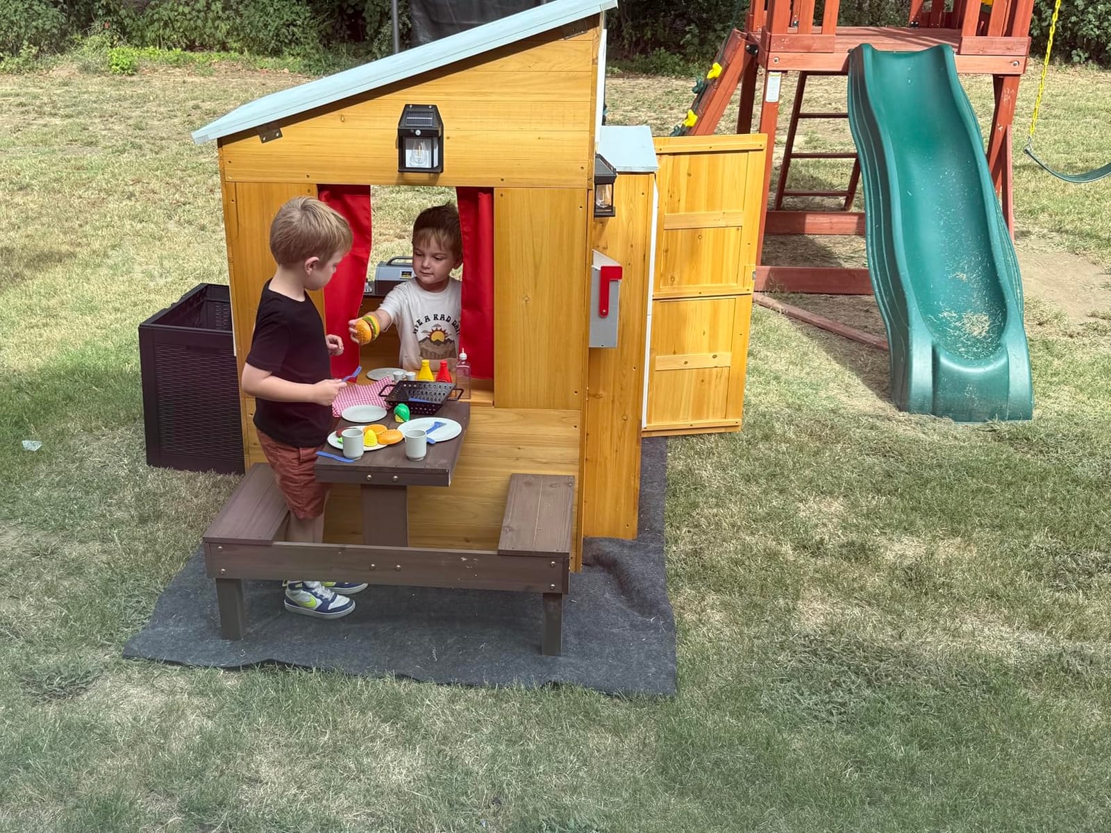 KidKraft Modern Outdoor Wooden Playhouse with Picnic Table, Mailbox and Outdoor Grill ,Gift for Ages 3+ customer photo 2