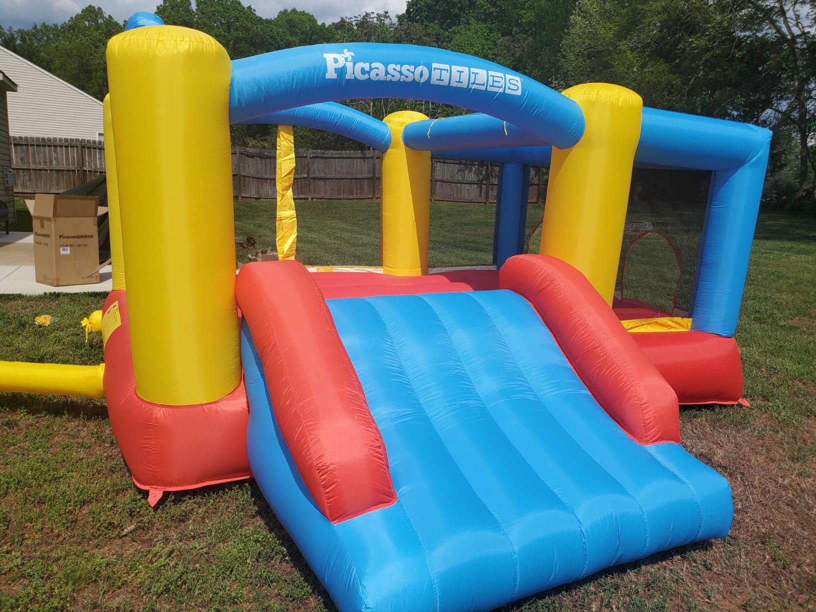[Upgrade Version] PicassoTiles KC102 12x10 Foot Inflatable Bouncer Jumping Bouncing House, Jump Slide, Dunk Playhouse w/Basketball Rim, 4 Sports Balls, Full-Size Entry, 580W ETL Certified Blower | 4 sports balls included, retractable sun shade canopy, ETL-certified 580-watt blower, quick 2-minute setup, ages 3 and up customer photo 2