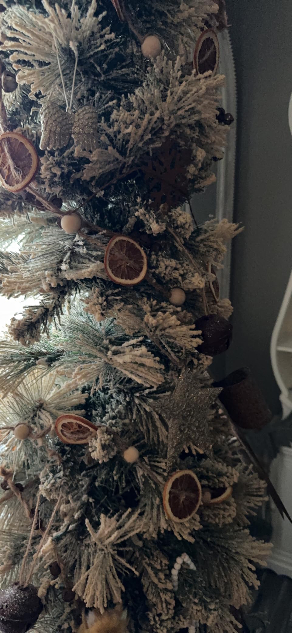 Puleo International 6.5ft Pre-Lit Flocked Portland Pine Pencil Christmas Tree with 300 Clear Lights, 410 Realistic Dense Snow Flocked Branch Tips, Easy Setup Artificial Trees with Sturdy Metal Stand customer photo 1