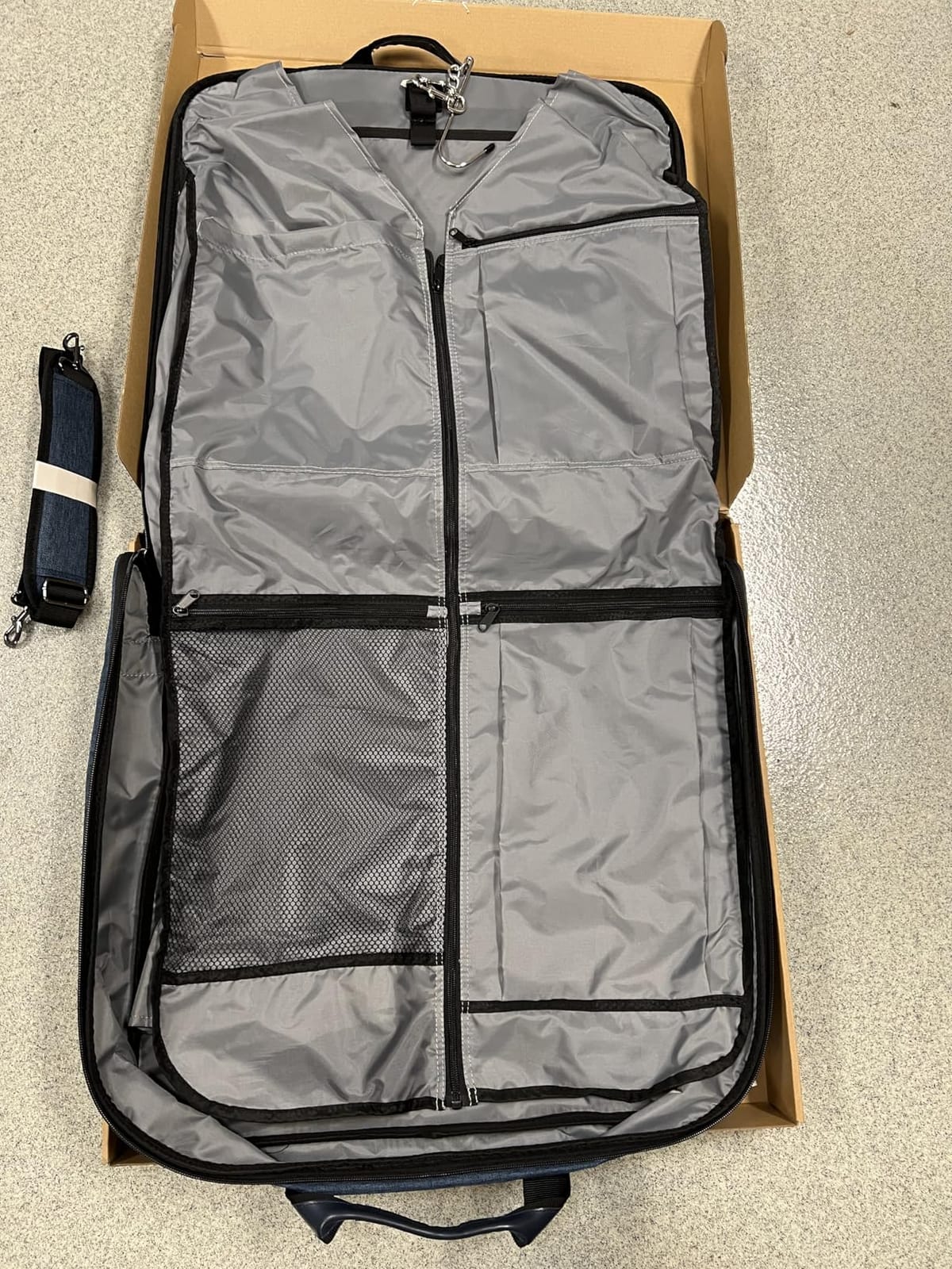 Amazon Basics Carry-On Garment Bag for Travel and Business Trips with Detachable Shoulder Strap, Hanging Suit Luggage, Wrinkle Free Cover for Suits Dresses Coats, Foldable with Shoe Compartment, Gray customer photo 1