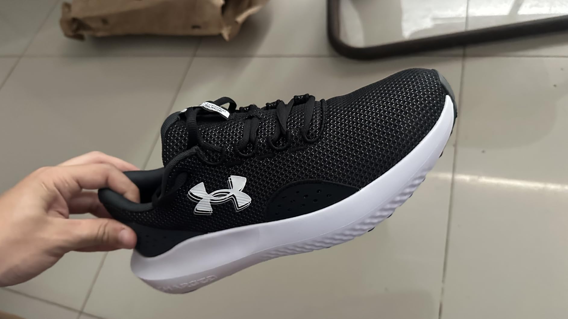 Under Armour Men's Charged Surge 4 Sneaker customer photo 1