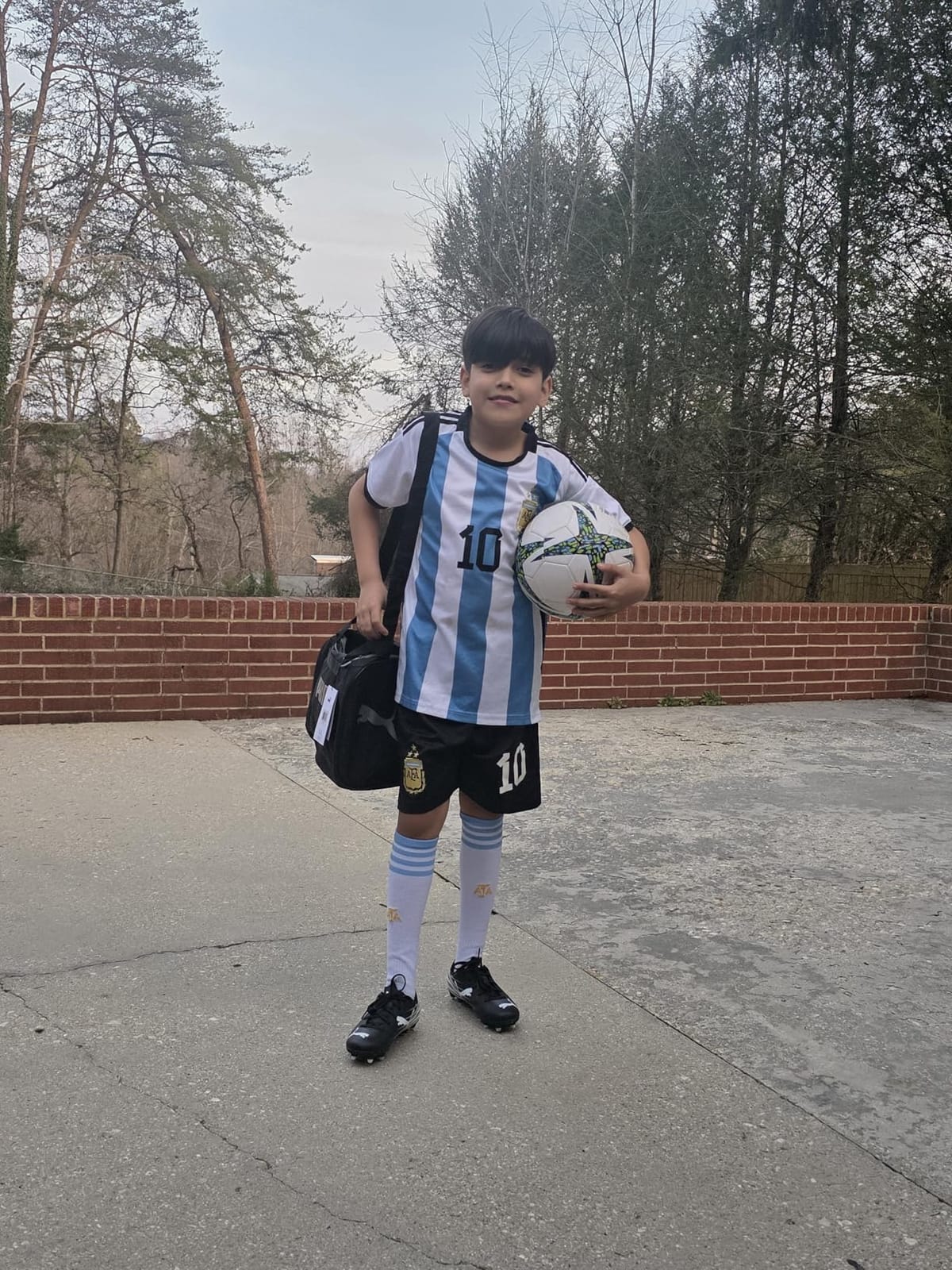 PUMA Kids' Attacanto Firm Ground Soccer Shoes customer photo 2
